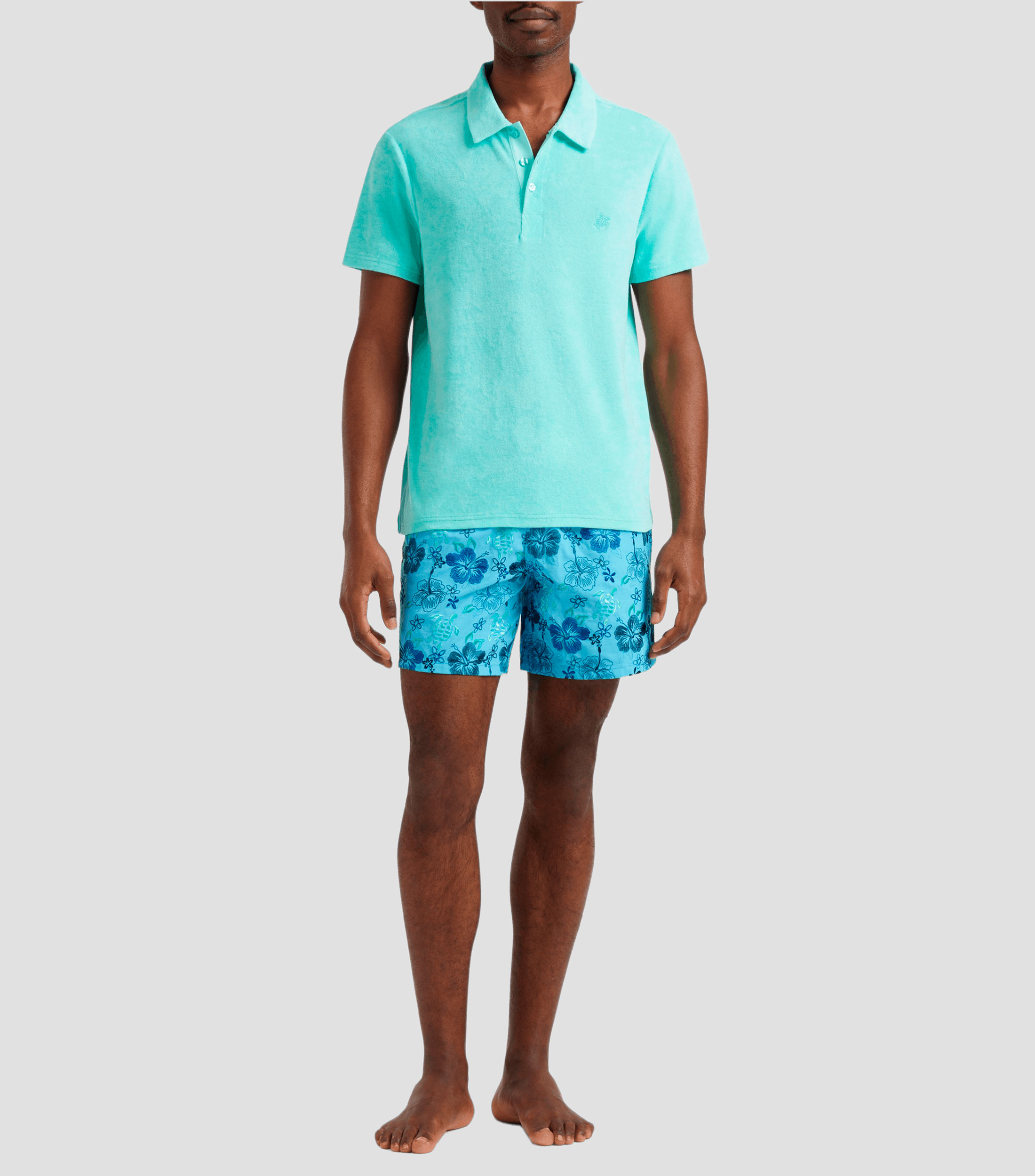Playera tipo polo con manga corta lisa Hombre